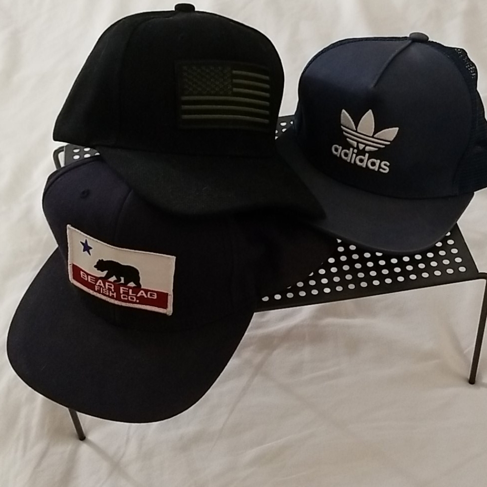 Three baseball caps